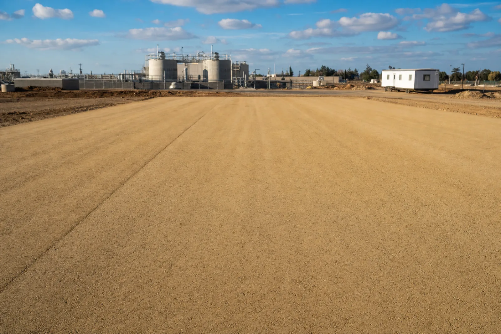 A finished, firm, compacted stabilized soil surface ready for traffic