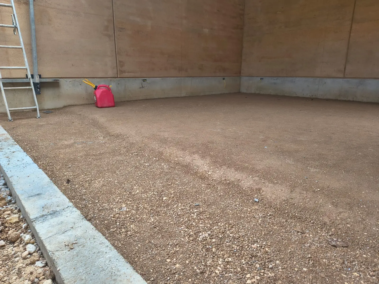Compacted stabilized pad base